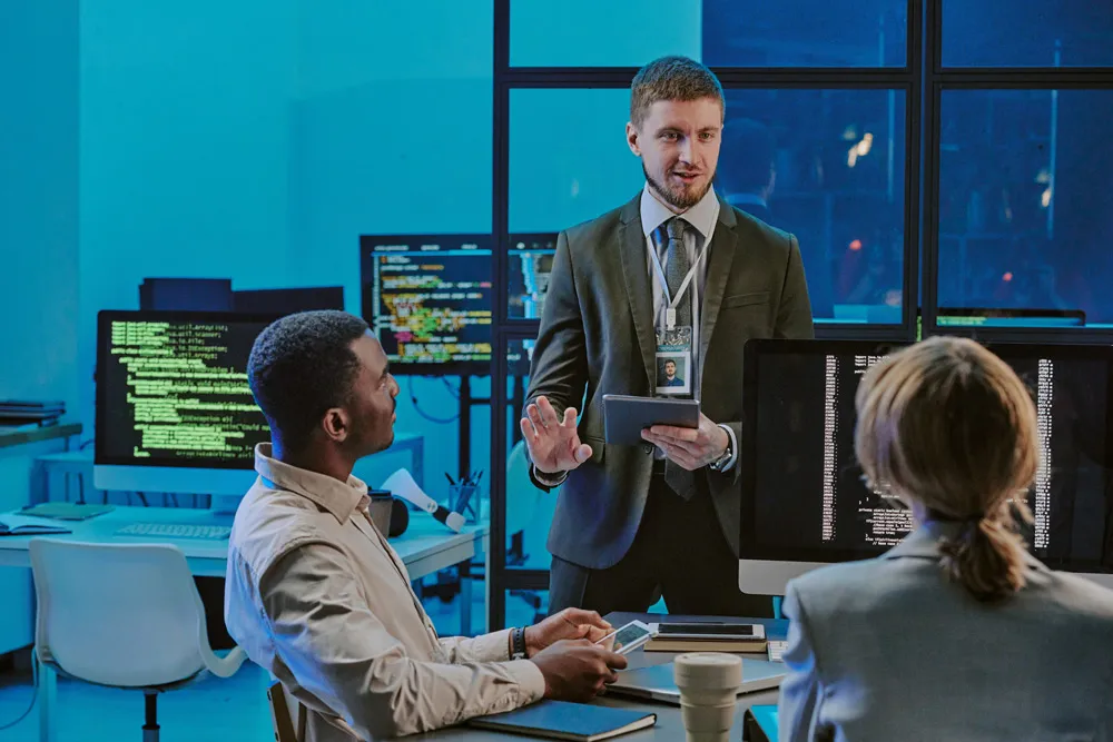 A cyber security expert reviewing an assessment