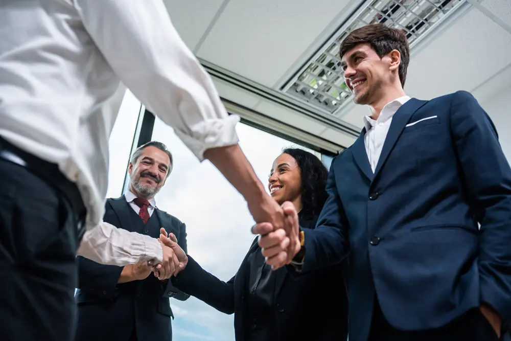 caucasian businessman making a handshake together 2025 03 24 23 14 58 utc